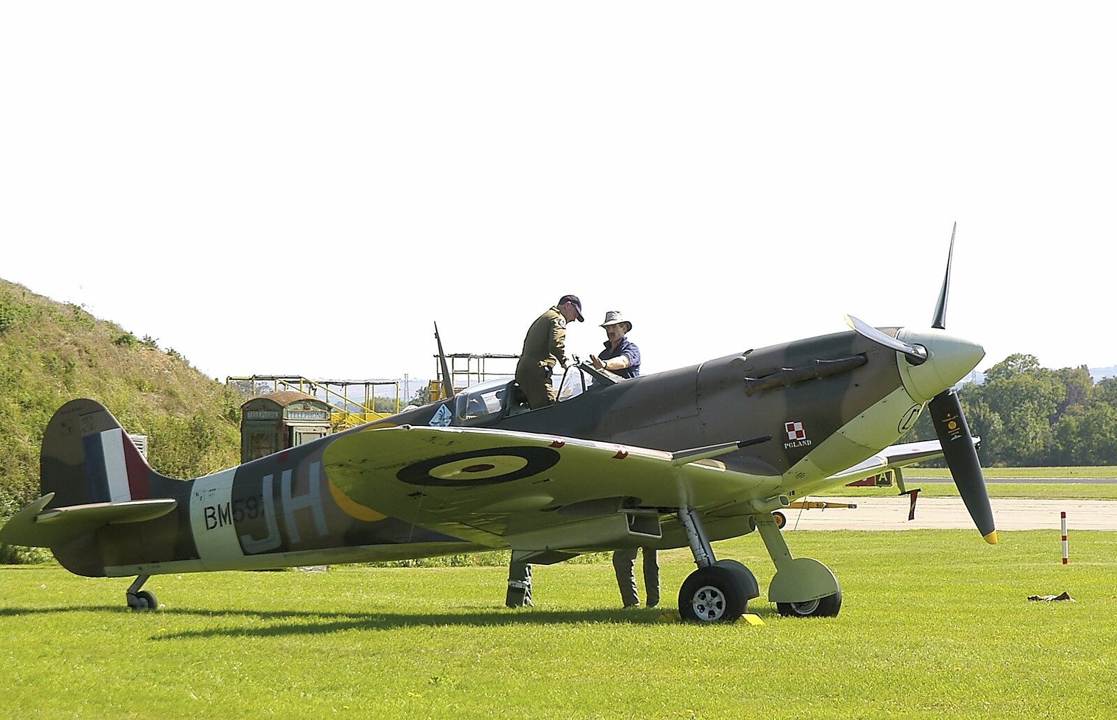 Spitfire JH-C, on the ground at Cambridge Airport from Grantchester Meadows, Alex Hill at Revs and Spitfires - 10th September 2006