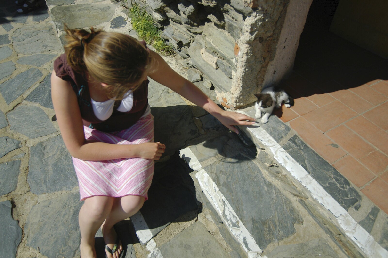 Isobel plays with a kitten from Salvador Dalí's House, Port Lligat, Spain - 19th Deptember 2006