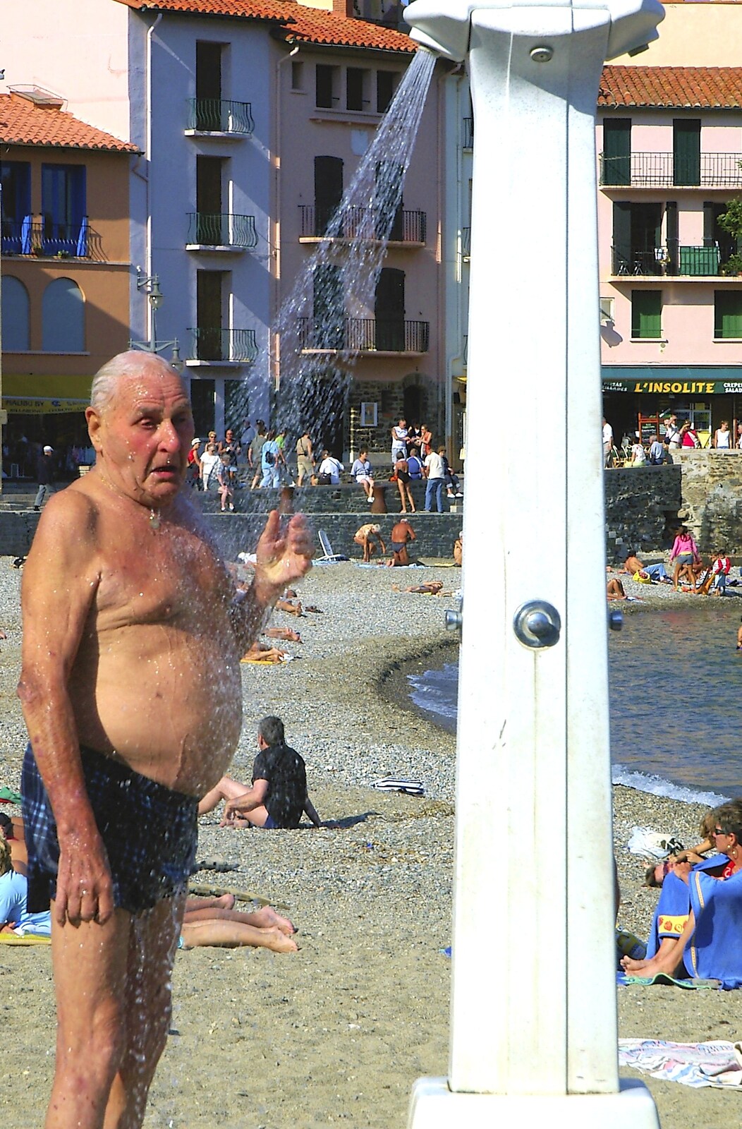 A geezer with moobs takes a shower on the beach from The Colourful Boats of Collioure, France - 20th September 2006