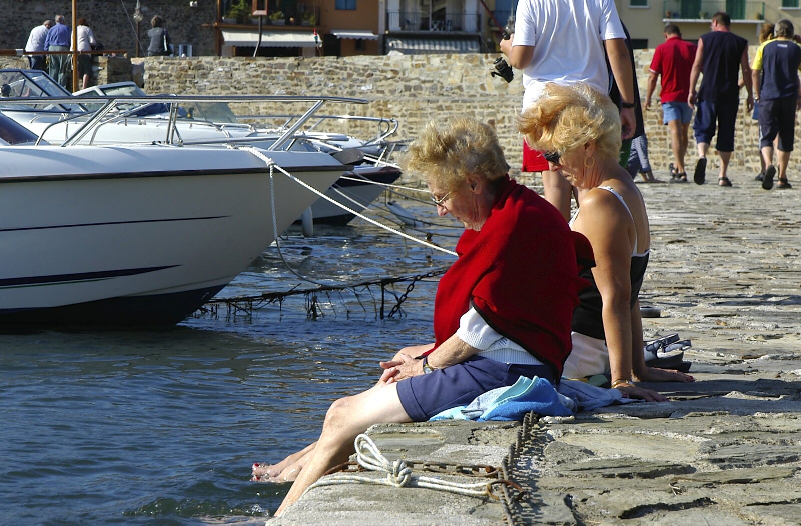 A couple of women have a paddle on the breakwater from The Colourful Boats of Collioure, France - 20th September 2006