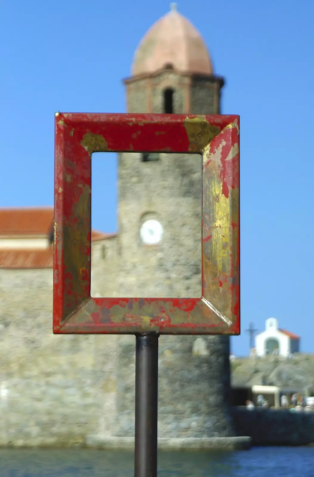 A picture-frame-on-a-stick picks out a clock, from The Colourful Boats of Collioure, France - 20th September 2006