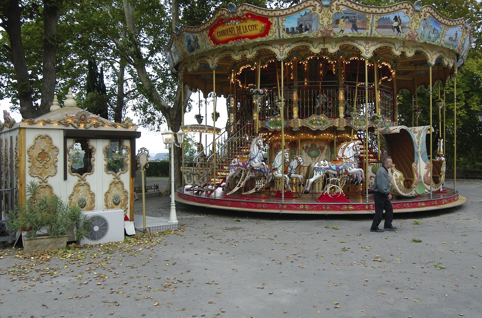Autumn leaves drift around a carousel from A Couple of Days in Carcassonne, Aude, France - 21st September 2006
