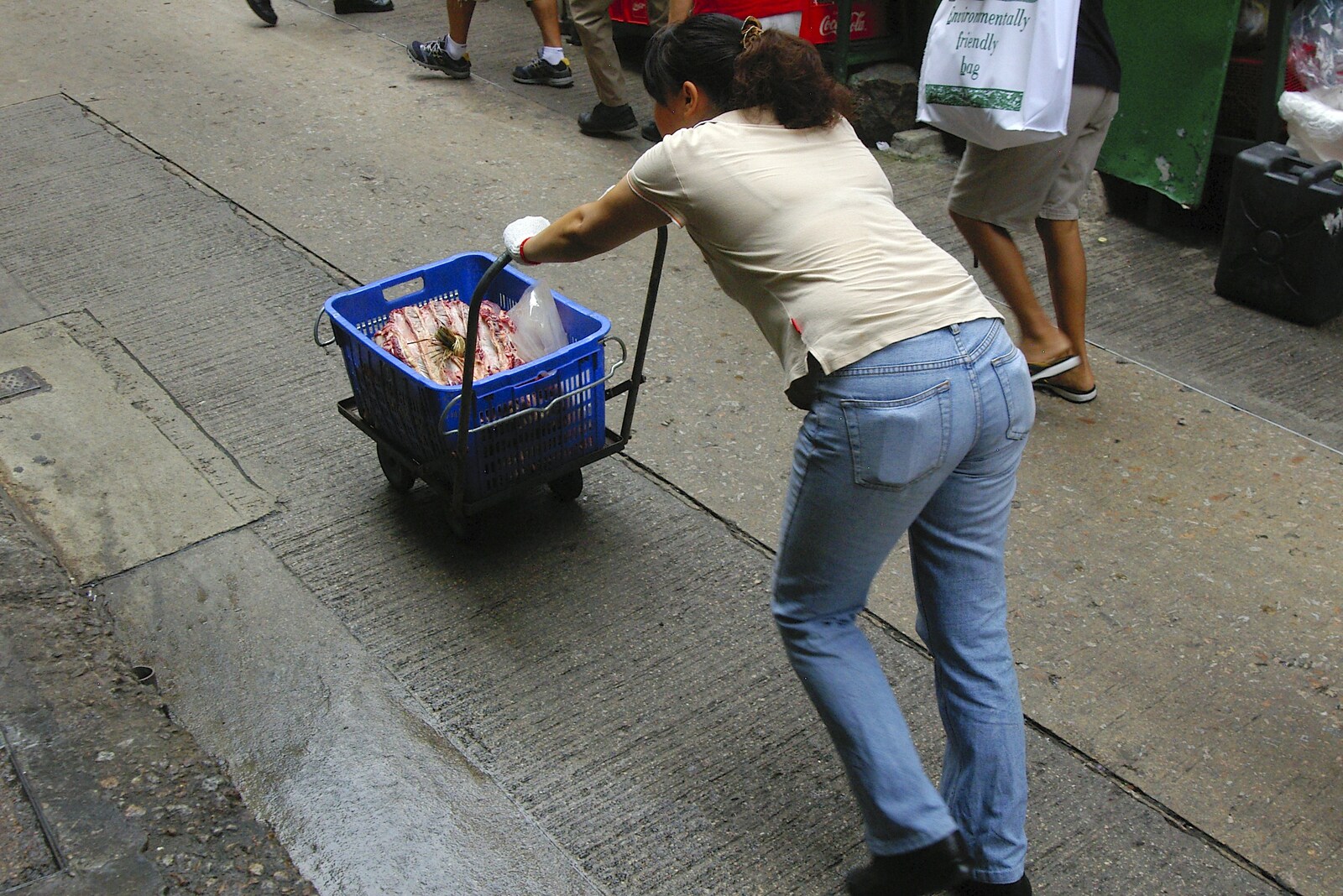 Some meat products are pushed around from Lan Kwai Fong Market, Hong Kong, China - 4th October 2006