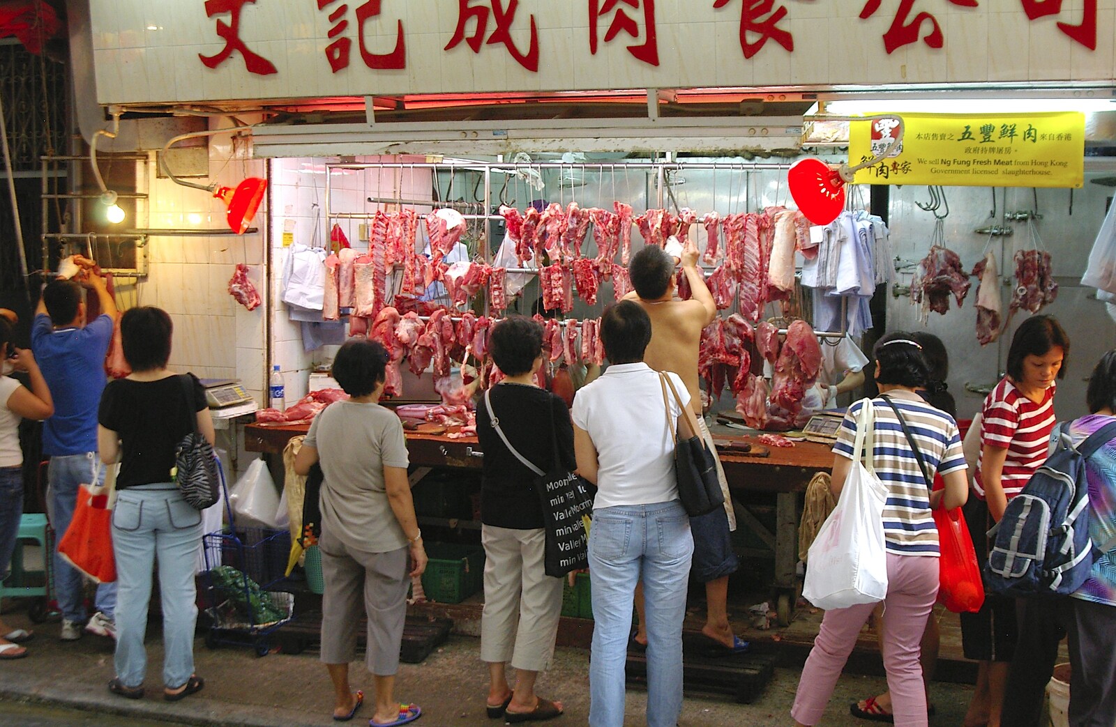 Meat is prepared in an open-air butchers from Lan Kwai Fong Market, Hong Kong, China - 4th October 2006