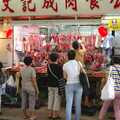 Meat is prepared in an open-air butchers, Lan Kwai Fong Market, Hong Kong, China - 4th October 2006