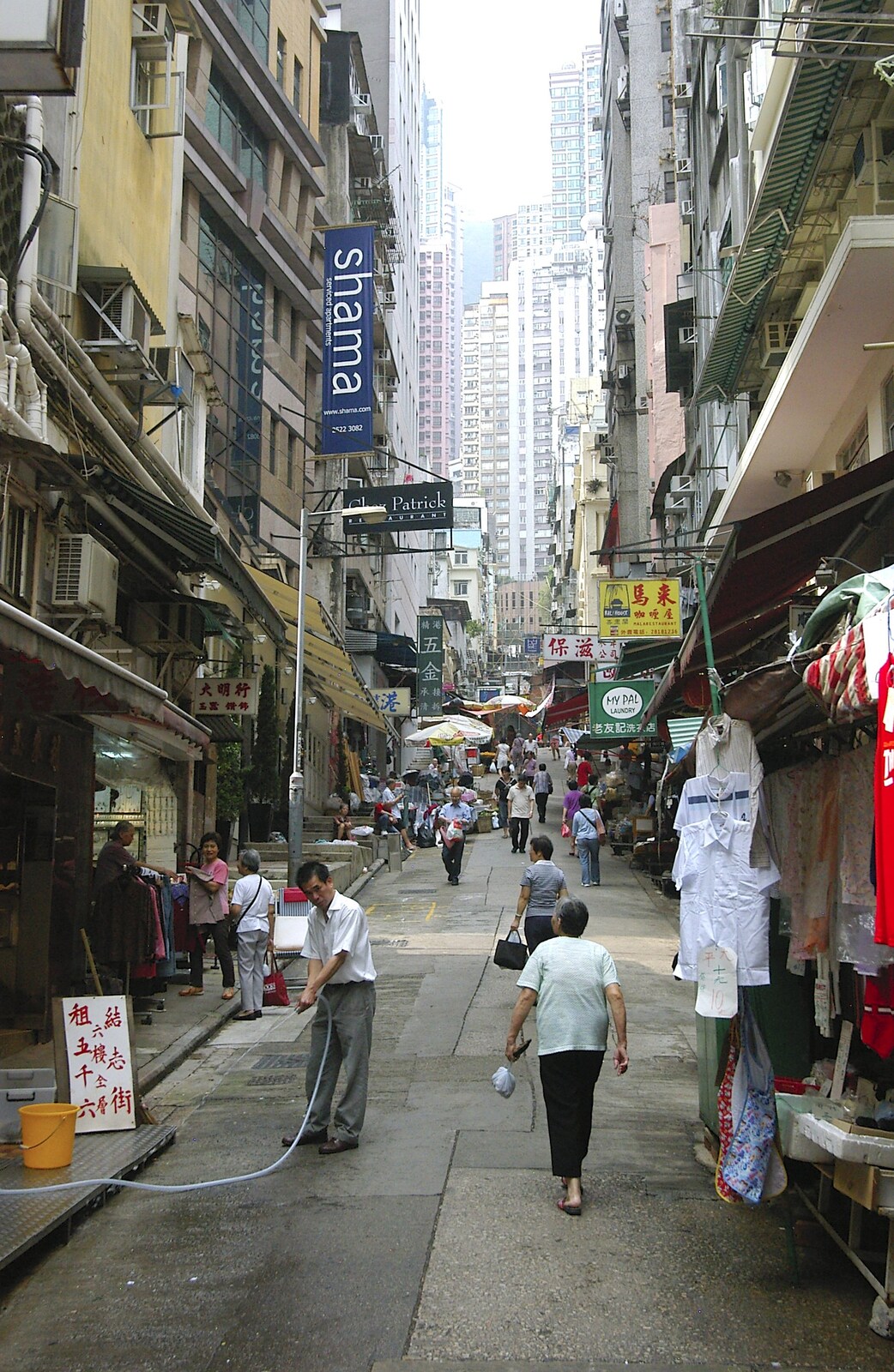 A street hemmed in by densely-packed tower blocks from Lan Kwai Fong Market, Hong Kong, China - 4th October 2006
