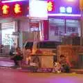 A girl sits on the kerb, waiting for sales, Nanjing by Night, Nanjing, Jiangsu Province, China - 4th October 2006