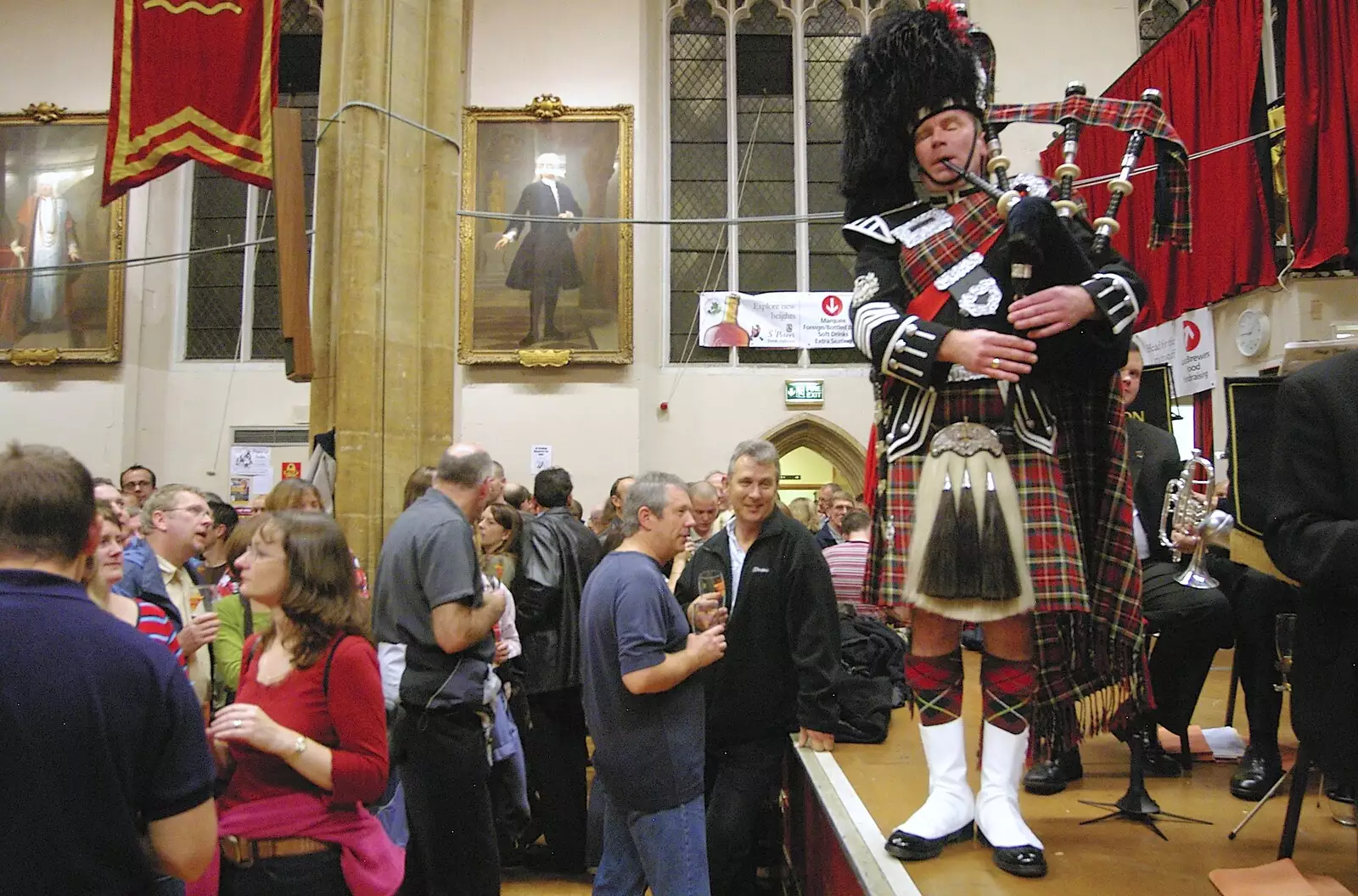 A bagpiper plays with the silver band, from The CAMRA Norwich Beer Festival, St. Andrew's Hall, Norwich - 25th October 2006