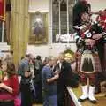 A bagpiper plays with the silver band, The CAMRA Norwich Beer Festival, St. Andrew's Hall, Norwich - 25th October 2006