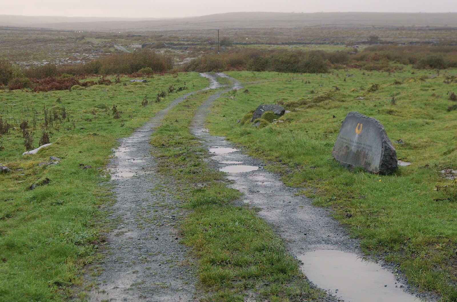 A track runs off to the horizon from Corofin, Ennistymon and The Burran, County Clare, Western Ireland - 27th October 2006