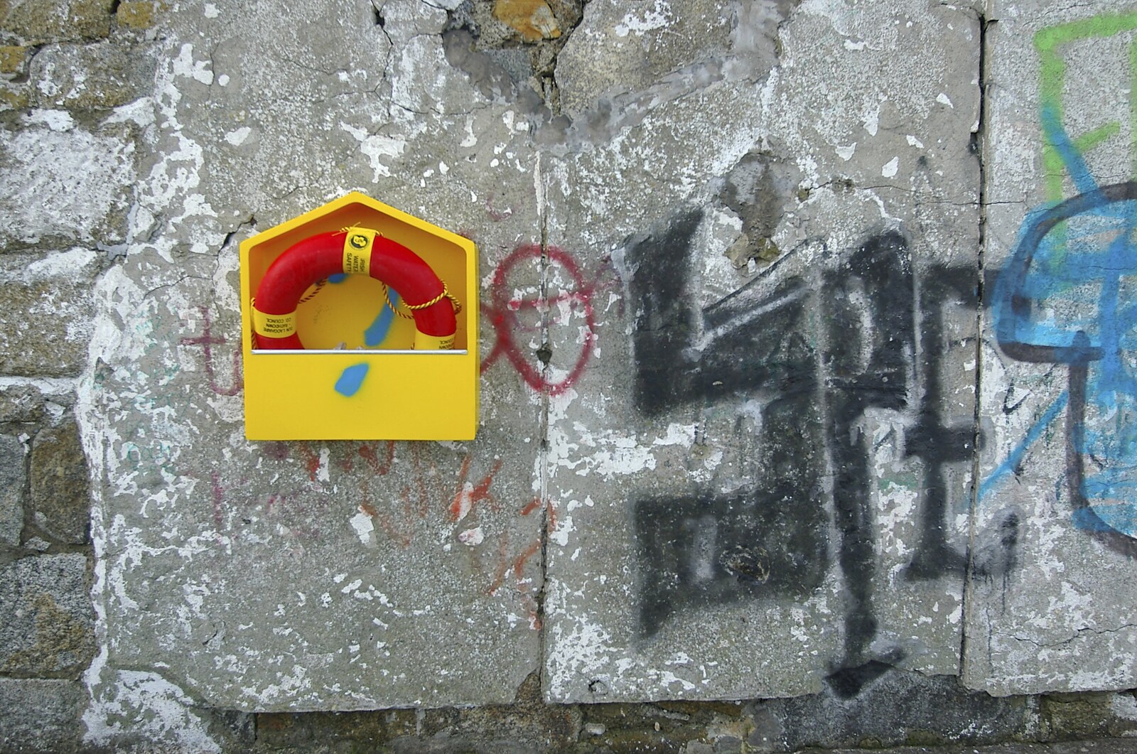 A life belt and some graffiti on the sea wall from Blackrock Mornings, Dublin County, Ireland - 29th October 2006