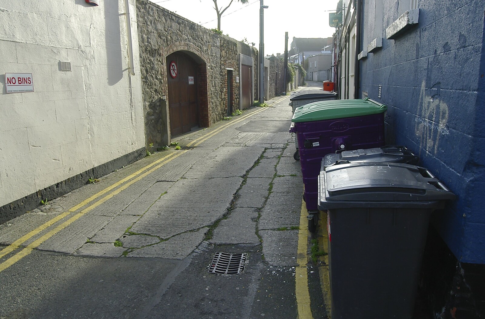 Wheelie bins face off to a 'no bins' sign from Blackrock Mornings, Dublin County, Ireland - 29th October 2006