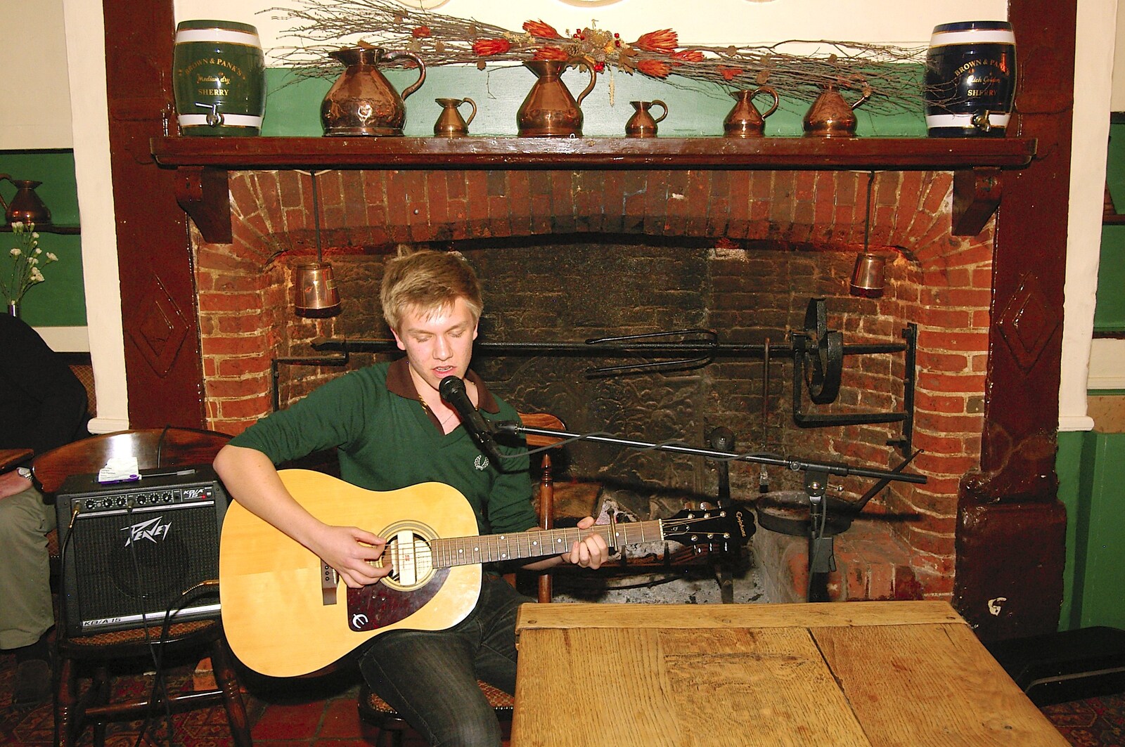 Rory by the fireplace in the Scole Inn from Rory Hill's "Tour in a Night", Norfolk and Suffolk - 17th November 2006