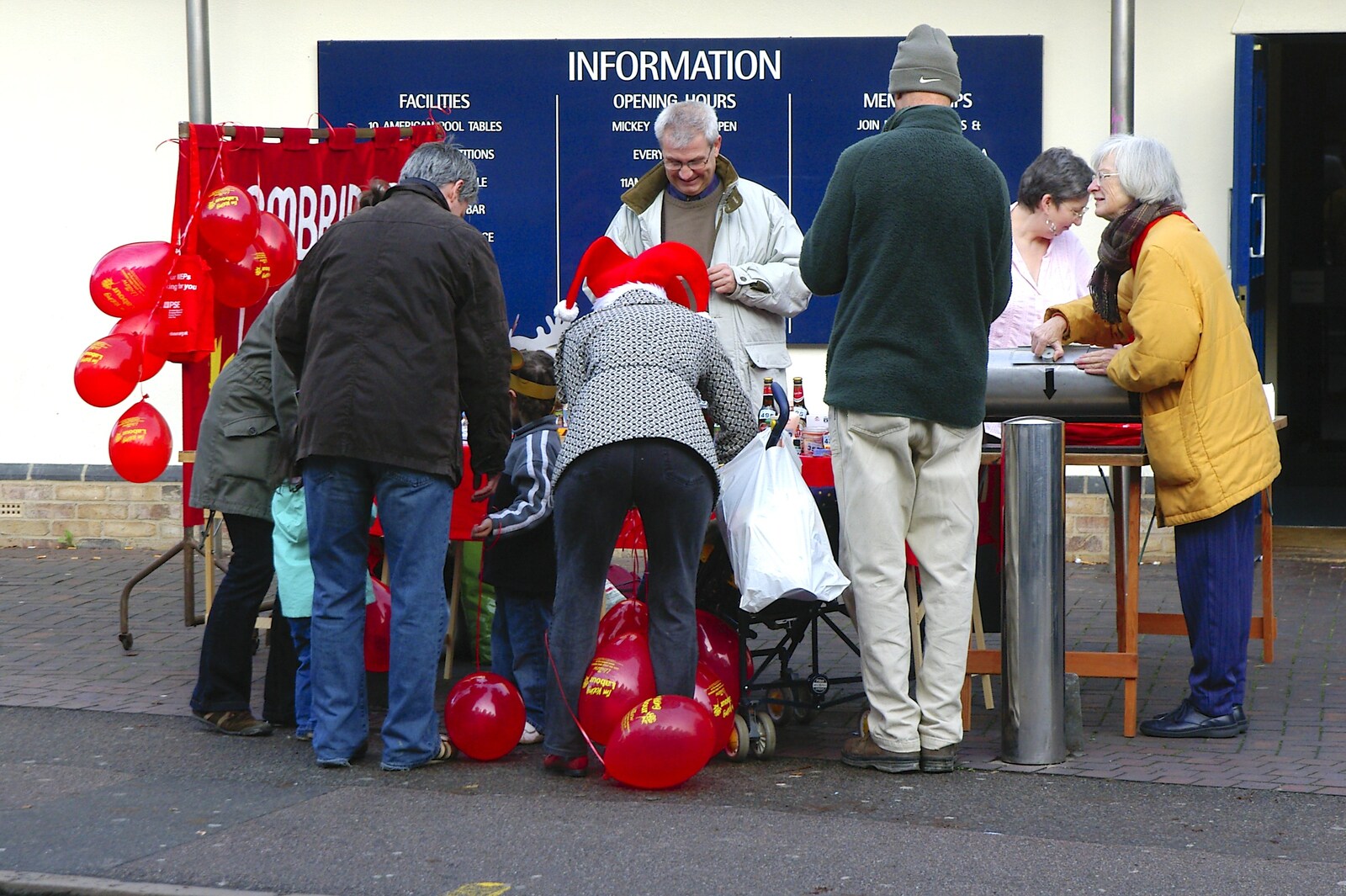 A busy info point outside Mickey Flynn's from The Winter Fair, Mill Road, Cambridge - 2nd December 2006