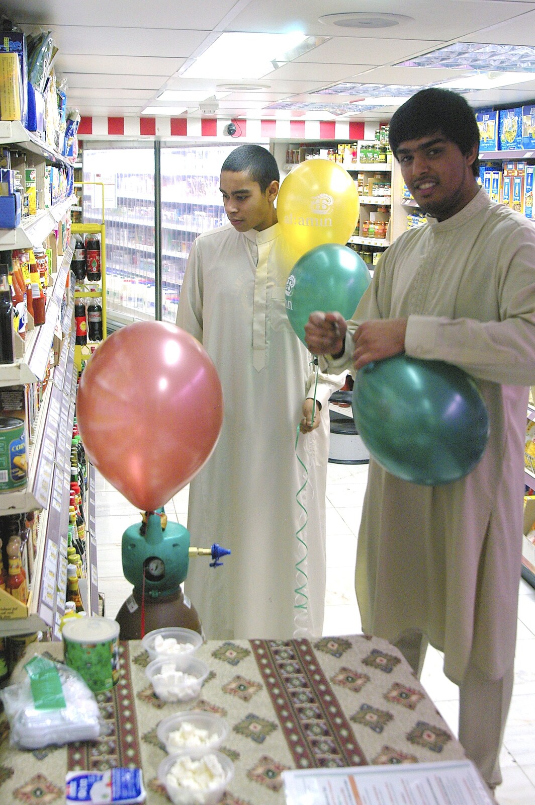 The Al Amin dudes inflate balloons with helium from The Winter Fair, Mill Road, Cambridge - 2nd December 2006