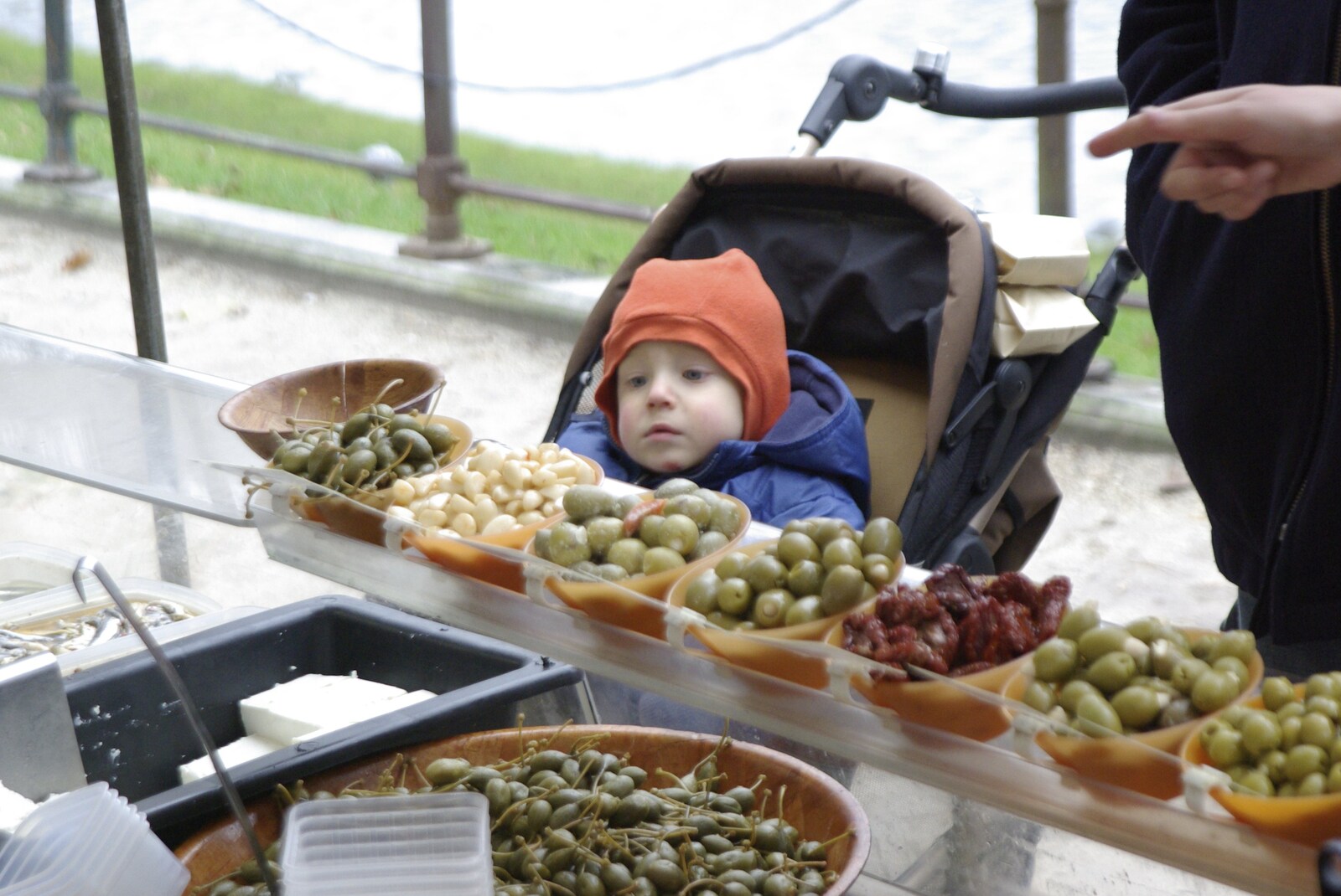 Kai looks at olives from The Christmas Markets of Brussels, Belgium - 1st January 2007
