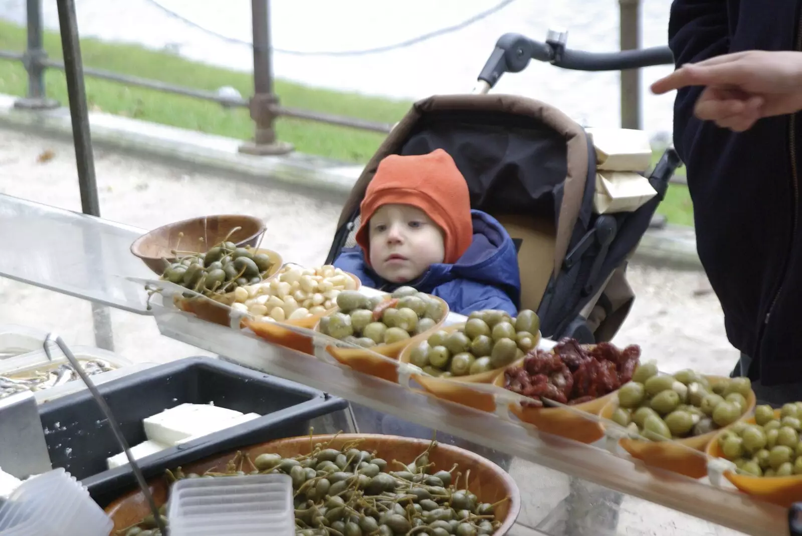 Kai looks at olives, from The Christmas Markets of Brussels, Belgium - 1st January 2007