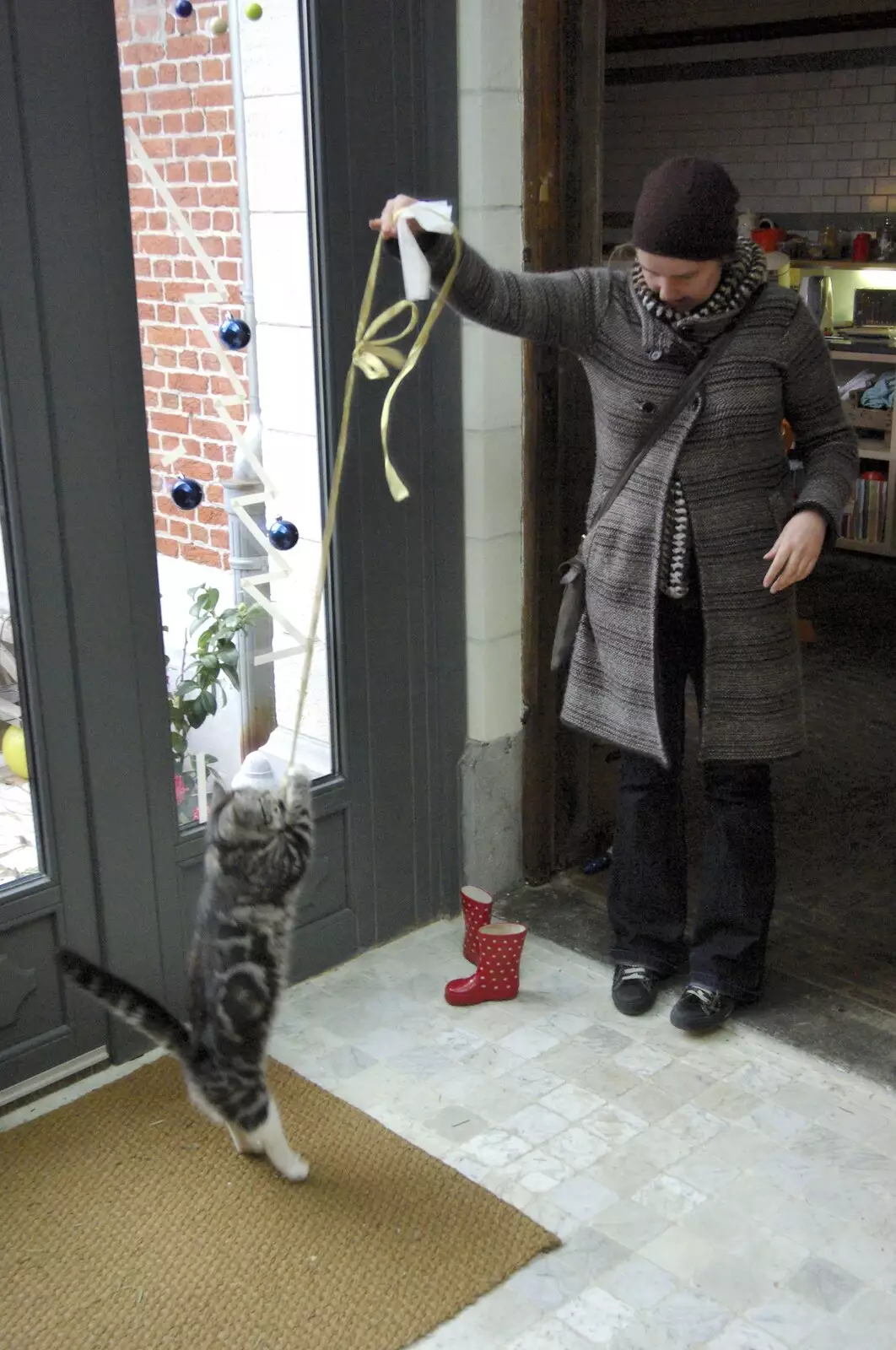 Cats cannot resist the power of string, from The Christmas Markets of Brussels, Belgium - 1st January 2007