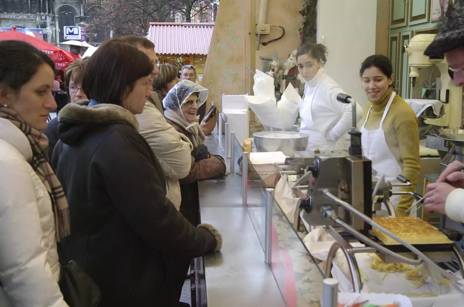 Customers wait for warm waffles, from The Christmas Markets of Brussels, Belgium - 1st January 2007