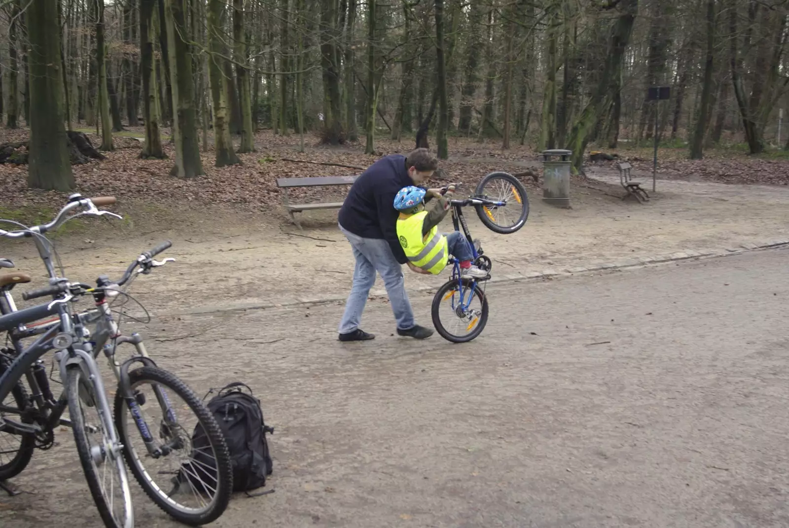 Pieter helps Natan learn wheelies, from The Christmas Markets of Brussels, Belgium - 1st January 2007