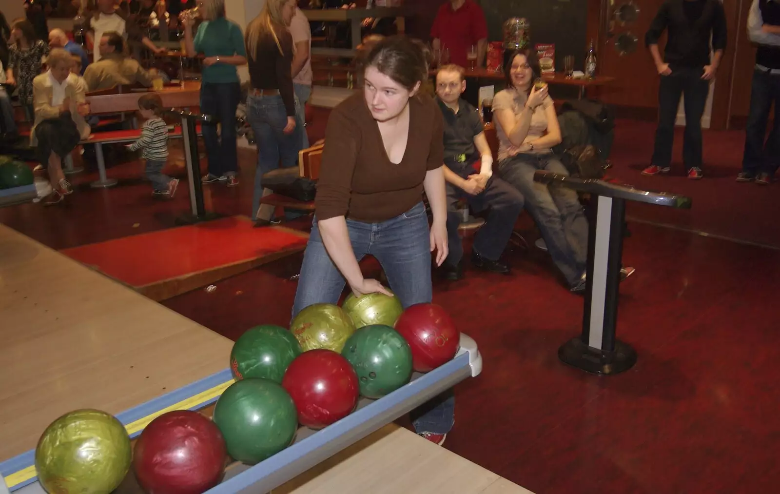 Isobel grabs the next ball, from Ten-pin Bowling and Birthdays, Cambridge Leisure Park, Cambridge - 17th February 2007