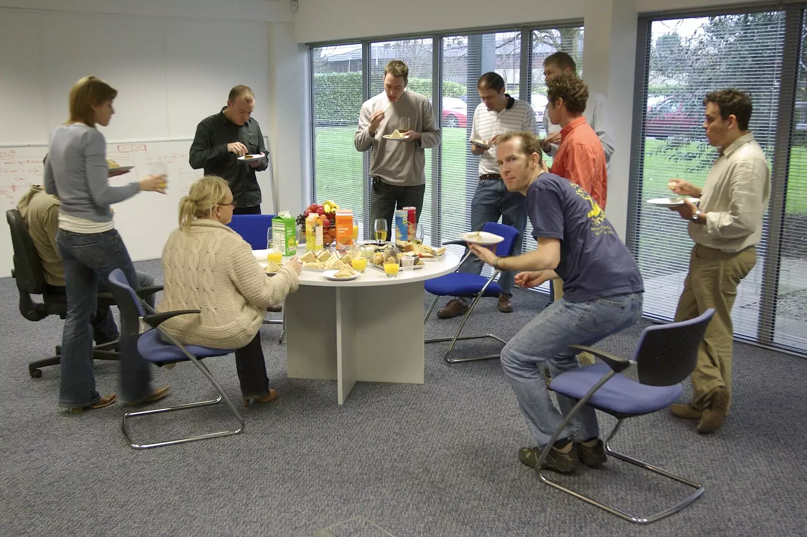 The new team gather around for lunchtime nibbles, from Taptu Moves Offices: Crossing Milton Road, Cambridge - 19th February 2007