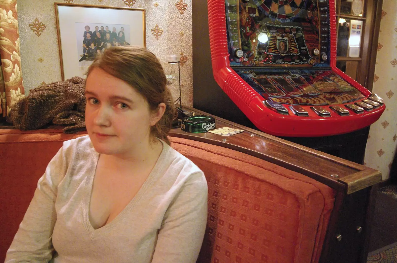 Isobel near the fruit machine, from Paul's 30th in the Swan Inn, Brome, Suffolk - 3rd March 2007