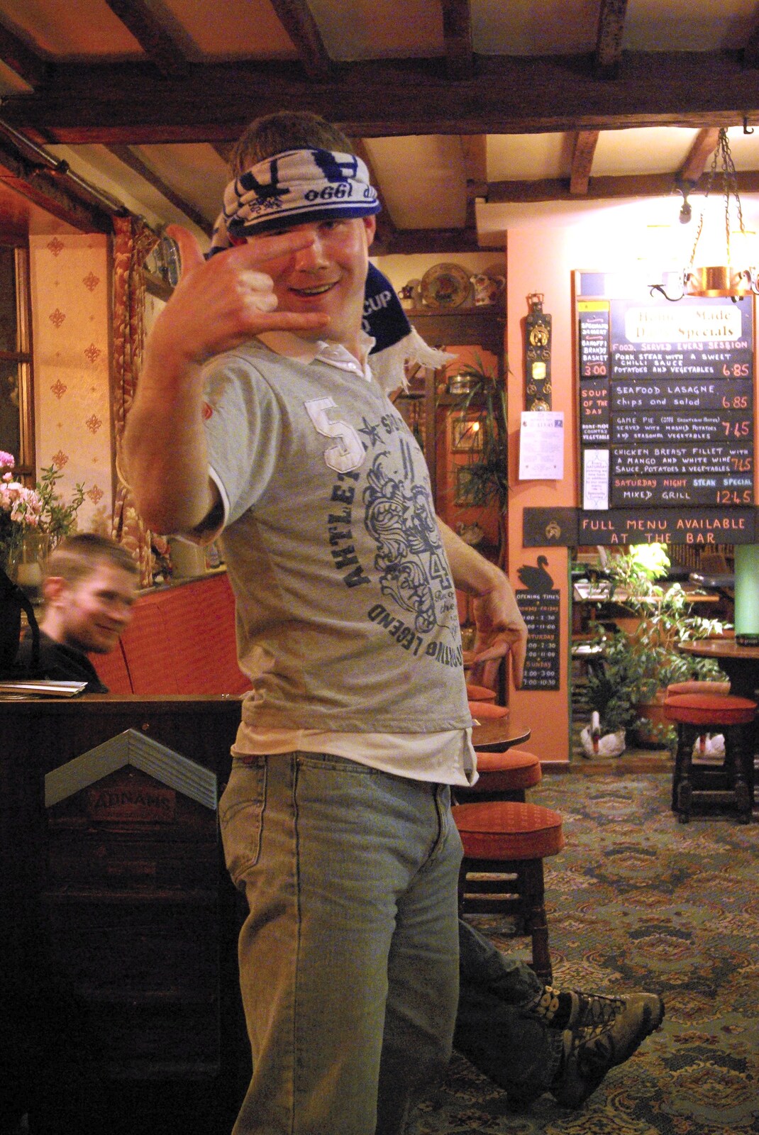 Paul's 30th in the Swan Inn, and a Night in the Salisbury Arms, Brome and Cambridge - 3rd March 2007: Mikey wraps a bar towel around his head and gives it a gang sign