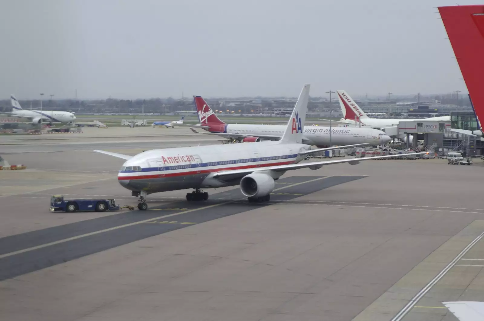 An American Airlines 777 heavy taxis to the gate, from A Central Park Marathon, Les Paul at the Iridium Club and an Empire State Sunset, New York, US - 25th March 2007