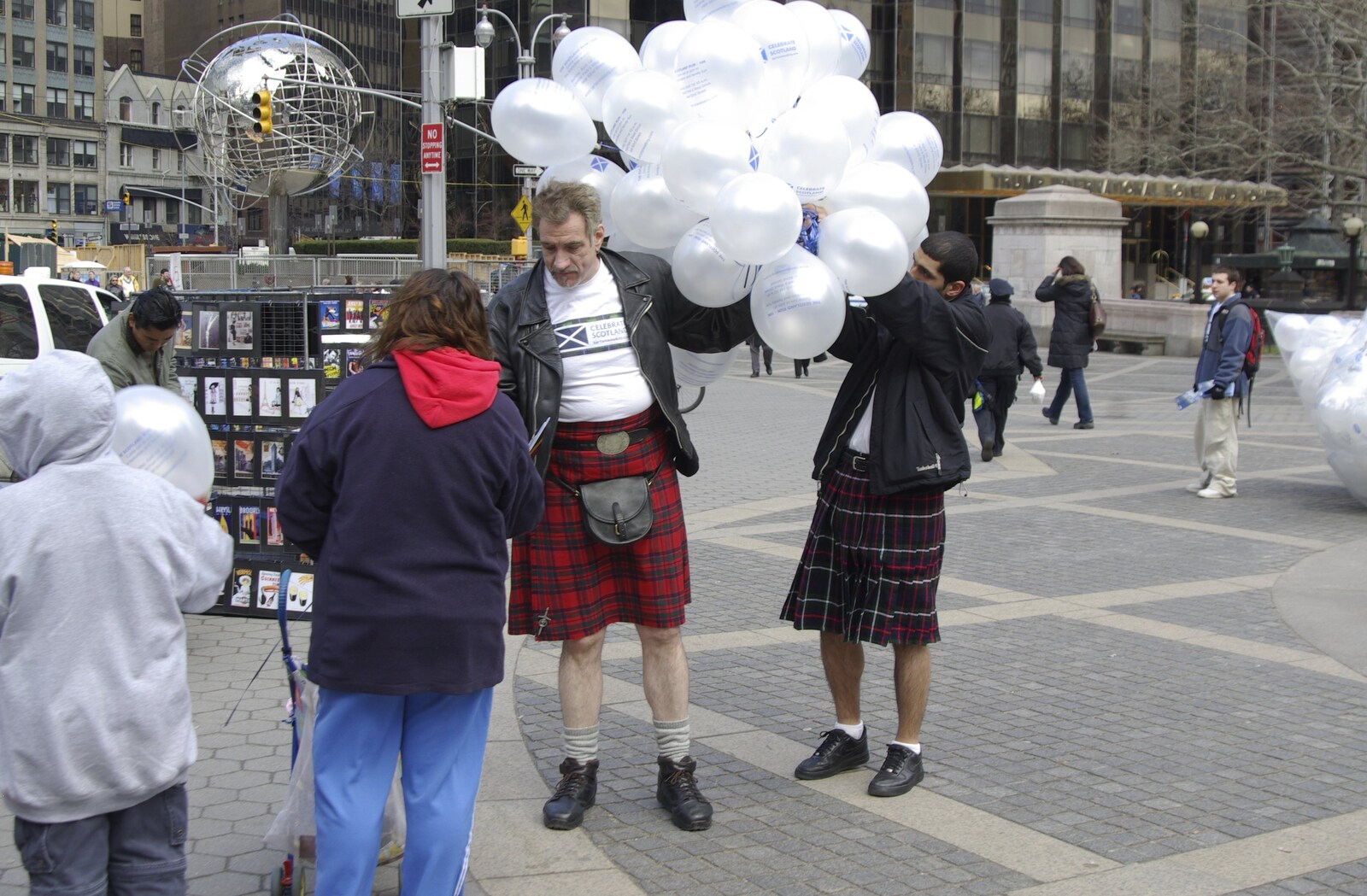 Men in kilts hand out balloons on Columbus Circle from A Central Park Marathon, Les Paul at the Iridium Club and an Empire State Sunset, New York, US - 25th March 2007