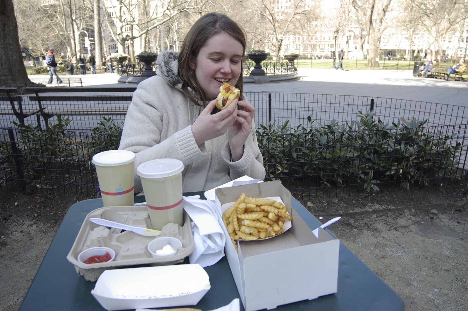Crossing Brooklyn Bridge, New York, US - 26th March 2007: Isobel eats a hot dog, with curly fries