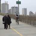 A cyclist carries a spare bike with him, Crossing Brooklyn Bridge, New York, US - 26th March 2007