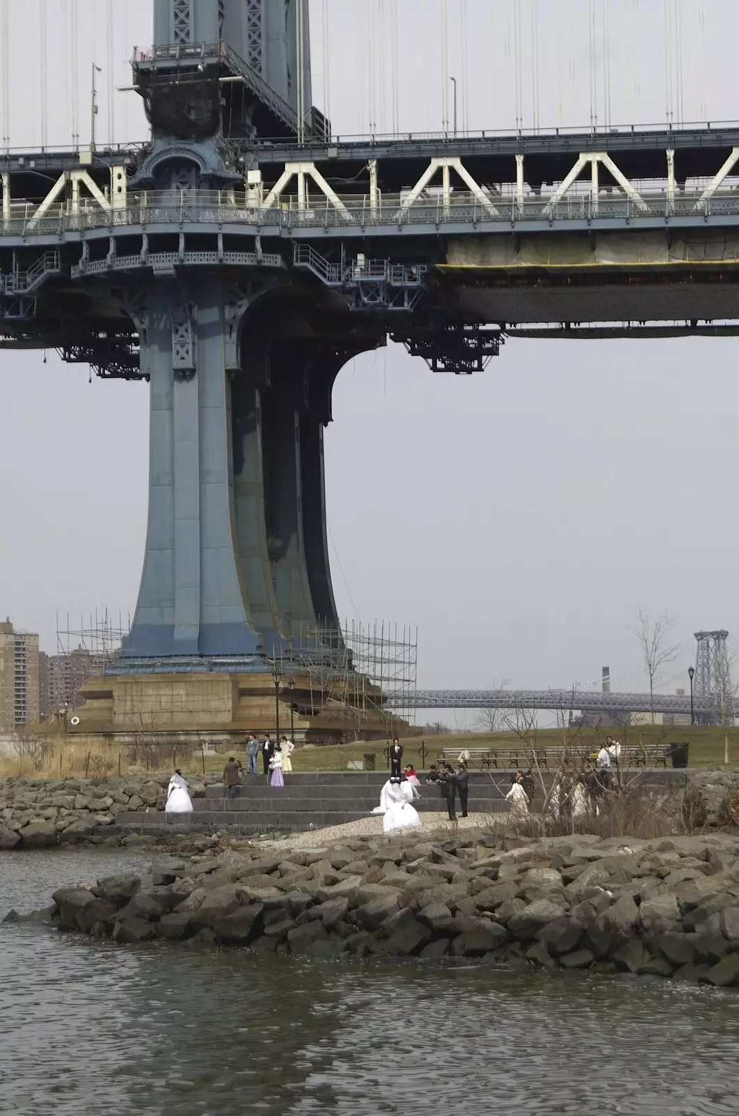 A wedding occurs in the shadow of the bridge, from Crossing Brooklyn Bridge, New York, US - 26th March 2007