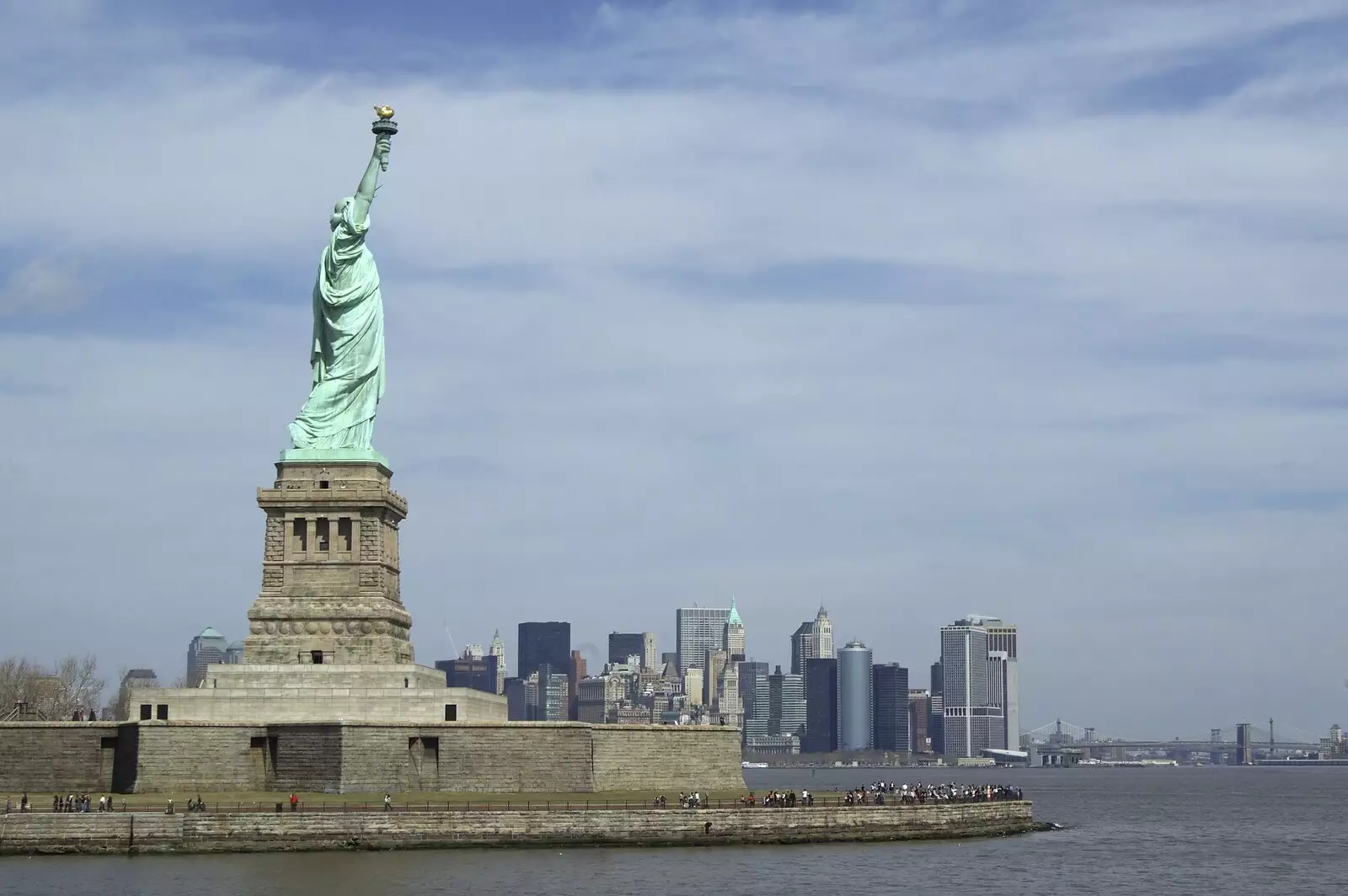 Liberty looks towards Manhattan, from Liberty Island, A Helicopter Trip and Madison Square Basketball, New York, US - 27th March 2007