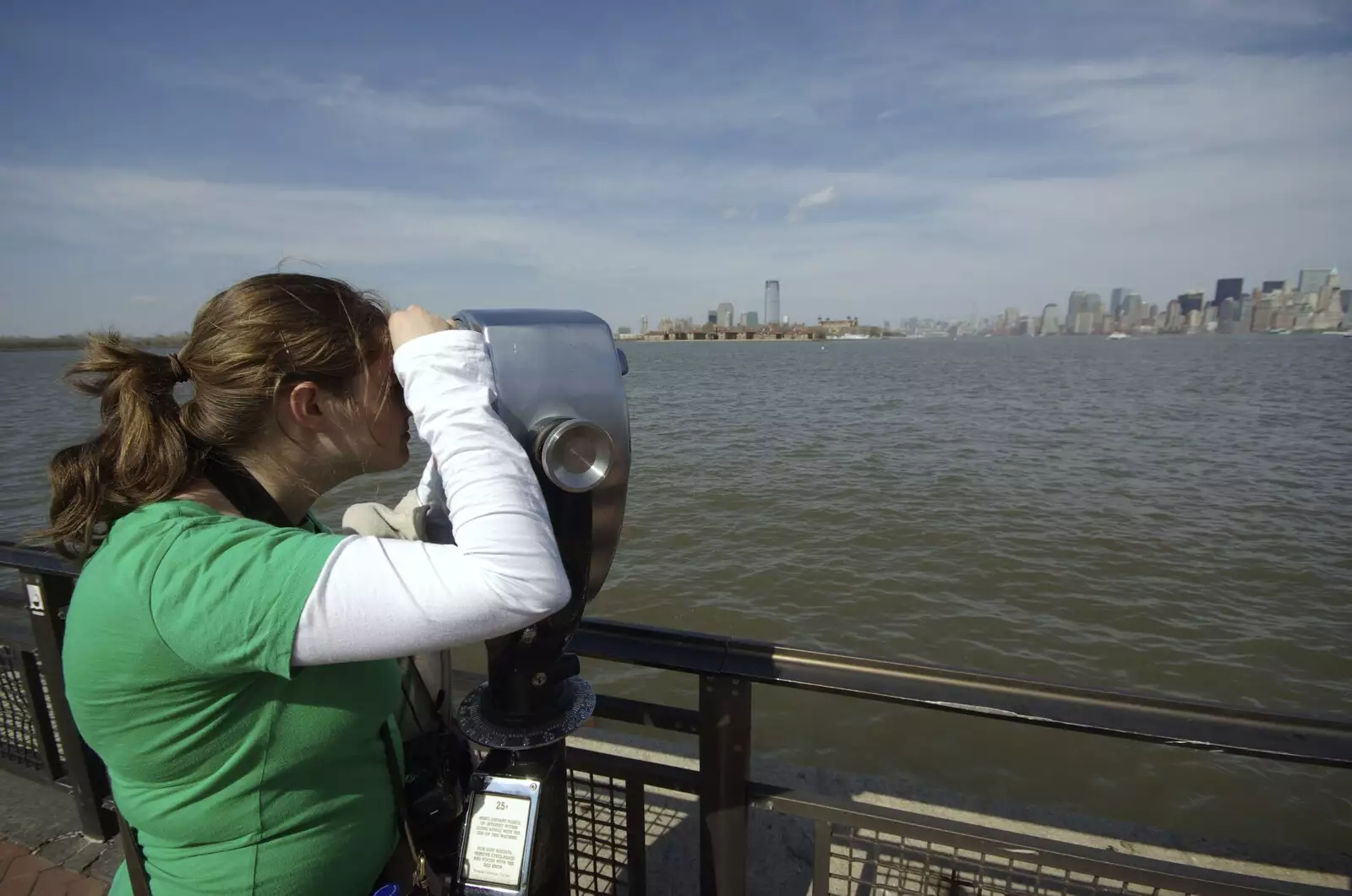 Isobel gives the peeper-scope a go, from Liberty Island, A Helicopter Trip and Madison Square Basketball, New York, US - 27th March 2007