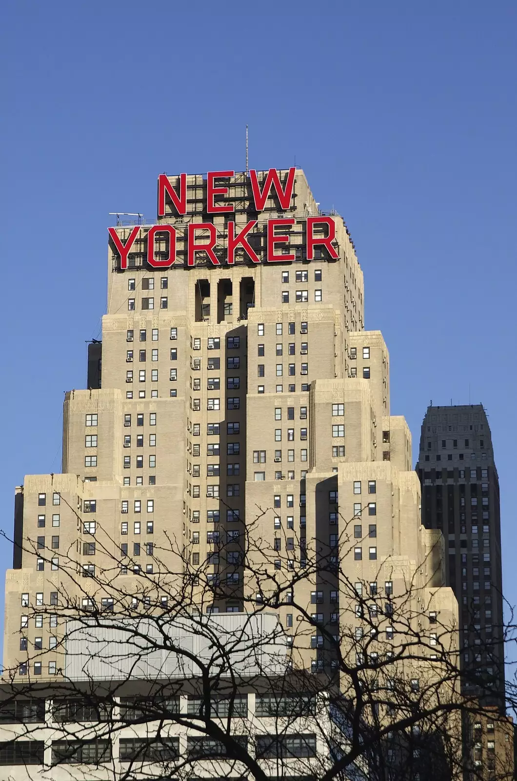 The New Yorker building, from Liberty Island, A Helicopter Trip and Madison Square Basketball, New York, US - 27th March 2007