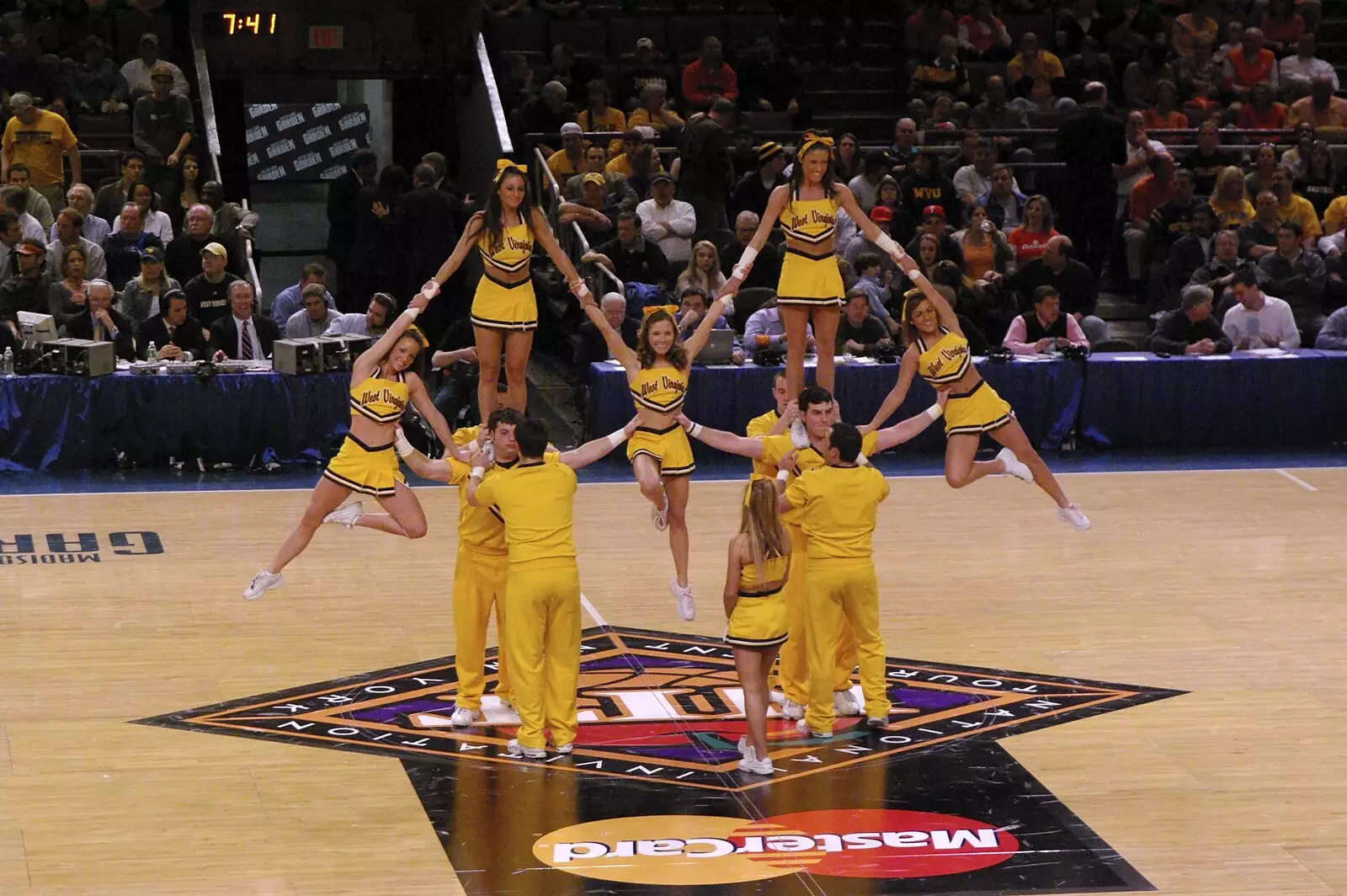 West Virginia's cheerleaders do some acrobatics, from Liberty Island, A Helicopter Trip and Madison Square Basketball, New York, US - 27th March 2007