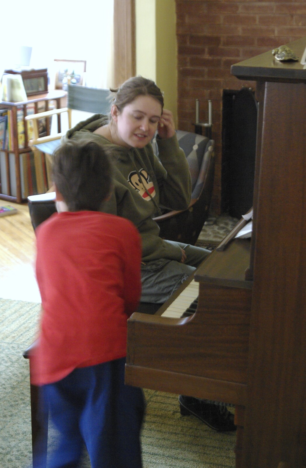 A Return to Fire Island, Long Island, New York State, US - 30th March 2007: Kai and Isobel play piano