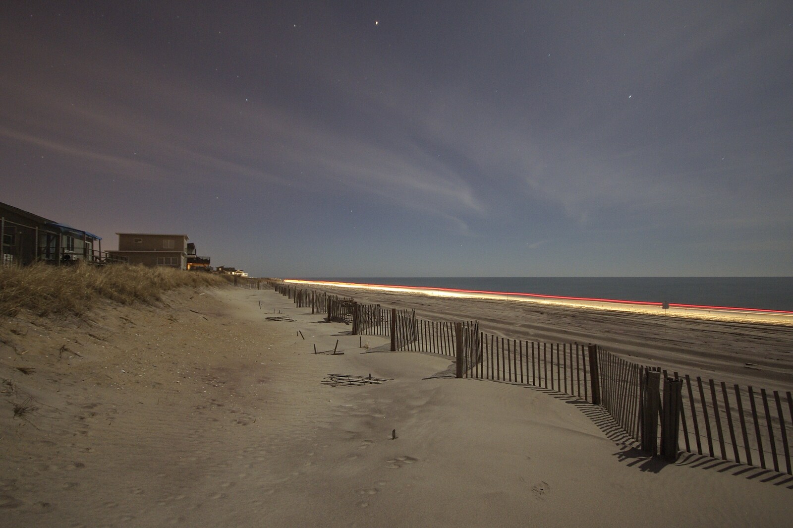 A Return to Fire Island, Long Island, New York State, US - 30th March 2007: A long exposure as an SUV drives past
