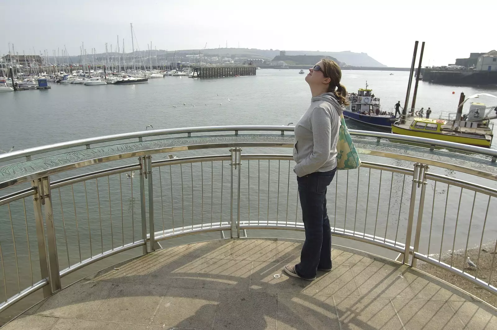 Isobel stands on the site of the Mayflower Steps, from A Trip to The Barbican, Plymouth, Devon - 6th April 2007