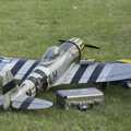 On the adjacent pitch, someone has a rather cool model aircraft - half Spitfire, half Mustang