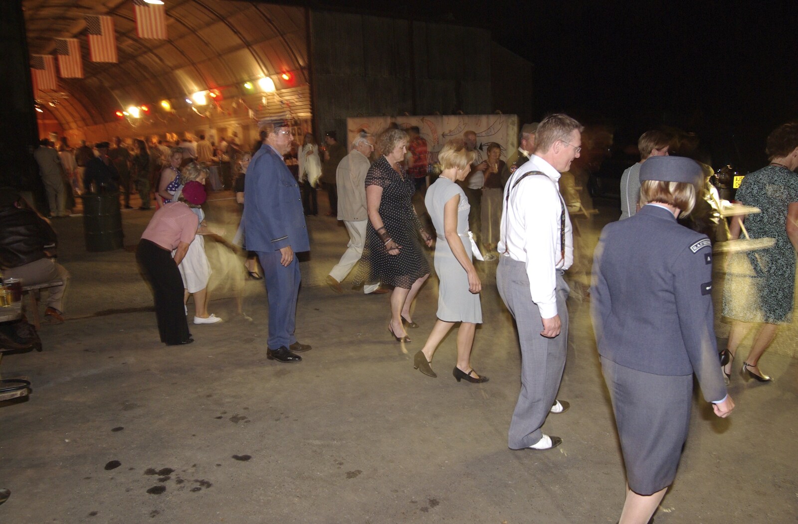 A 1940s Airfield Hangar Dance, Debach, Suffolk - 9th June 2007: Some sort of line dancing occurs outside