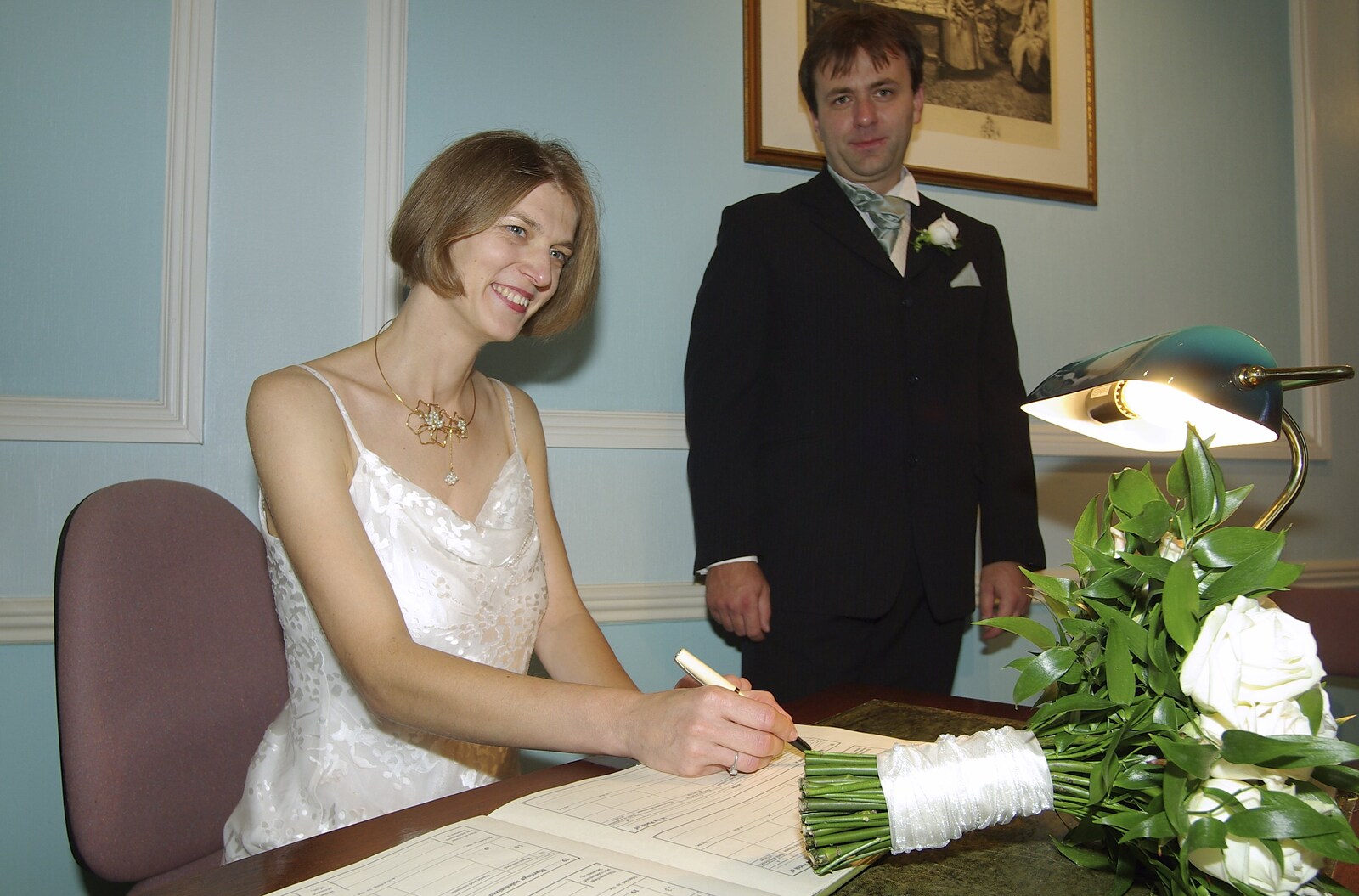 Liviu and Christina's Wedding Day, Babraham, Cambridge - 11th August 2007: Christina does a spot of fake signing for the cameras, as Liviu looks on
