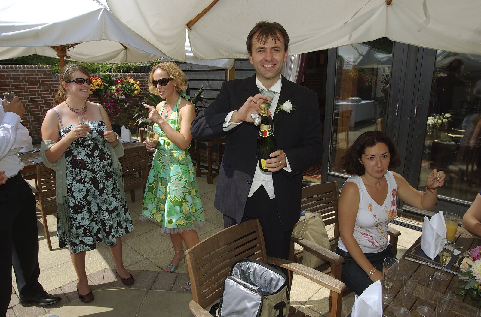 Liviu and Christina's Wedding Day, Babraham, Cambridge - 11th August 2007: Liviu waves a bottle of bubbly about