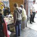Isobel scopes out a WI stall in Sandbach Market, A Road Trip to Ireland Via Sandbach and Conwy, Cheshire and Wales - 21st September 2007
