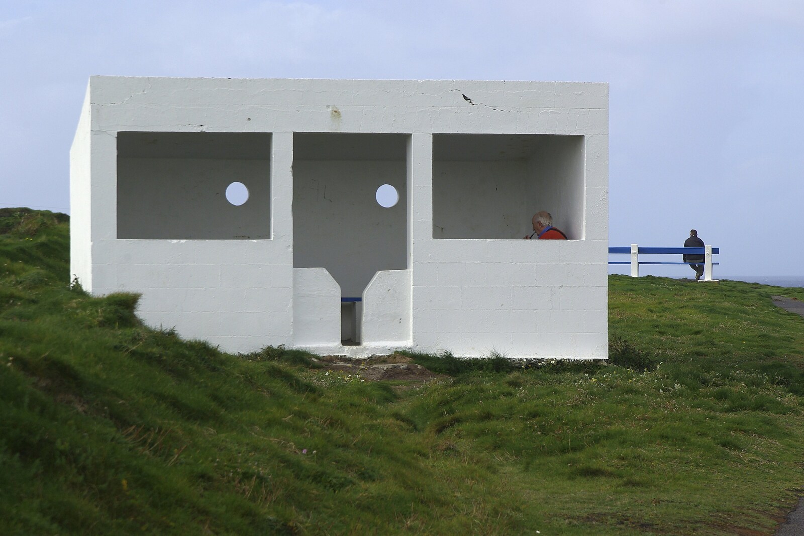 30th Birthday Party in Kilkee, County Clare, Ireland - 22nd September 2007: An old dude contemplates life and his pipe in a concrete shelter