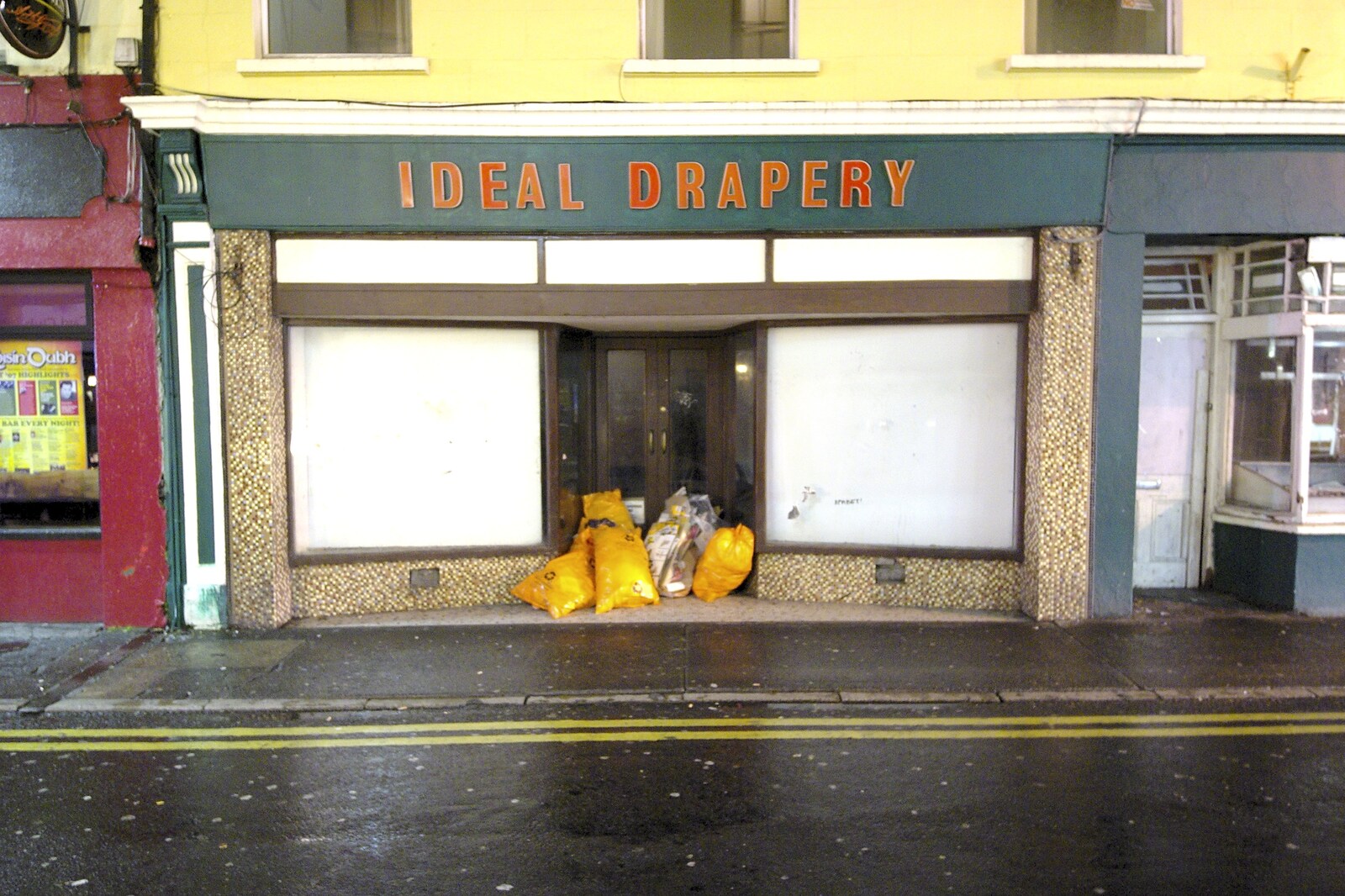 Kilkee to Galway, Connacht, Ireland - 23rd September 2007: Ideal Drapery: an abandoned shop