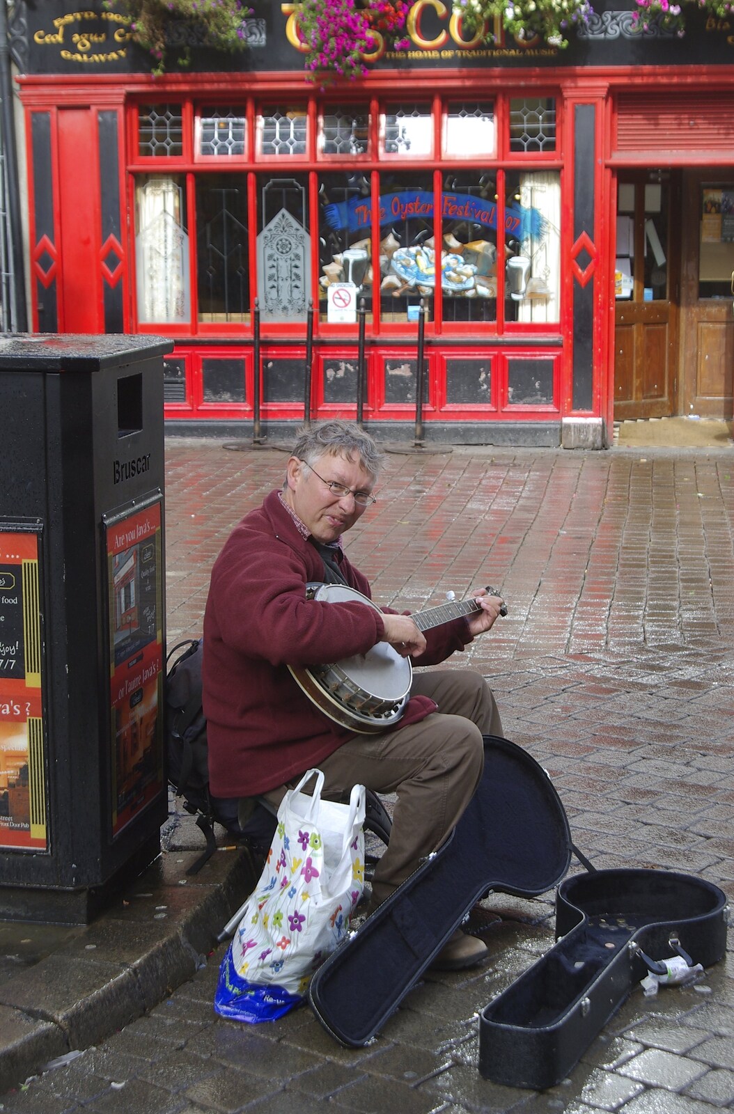 Kilkee to Galway, Connacht, Ireland - 23rd September 2007: Busking banjo