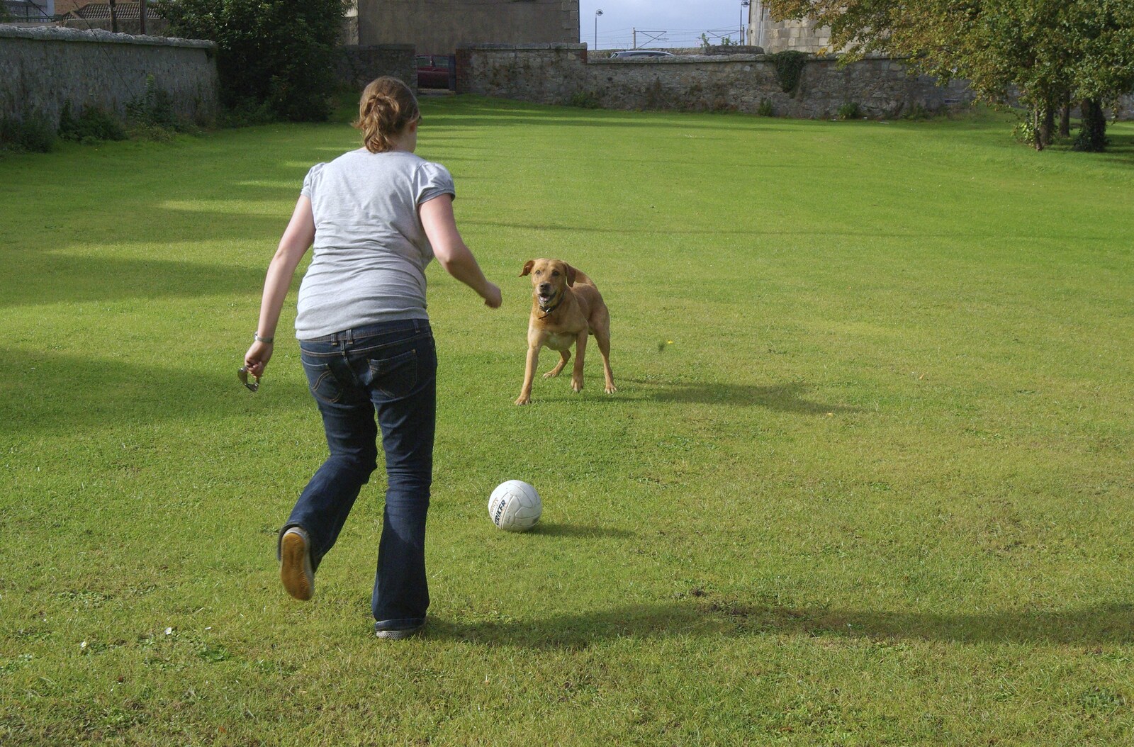 Blackrock and Dublin, Ireland - 24th September 2007: Isobel lines up to kick a ball for Oscar to chase