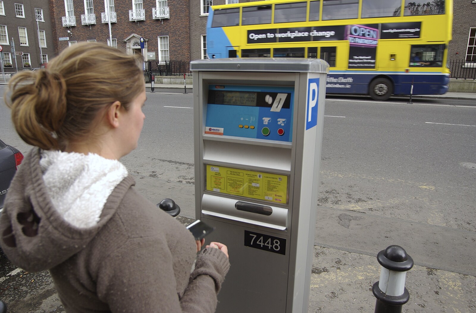 Blackrock and Dublin, Ireland - 24th September 2007: Isobel contemplates a parking meter